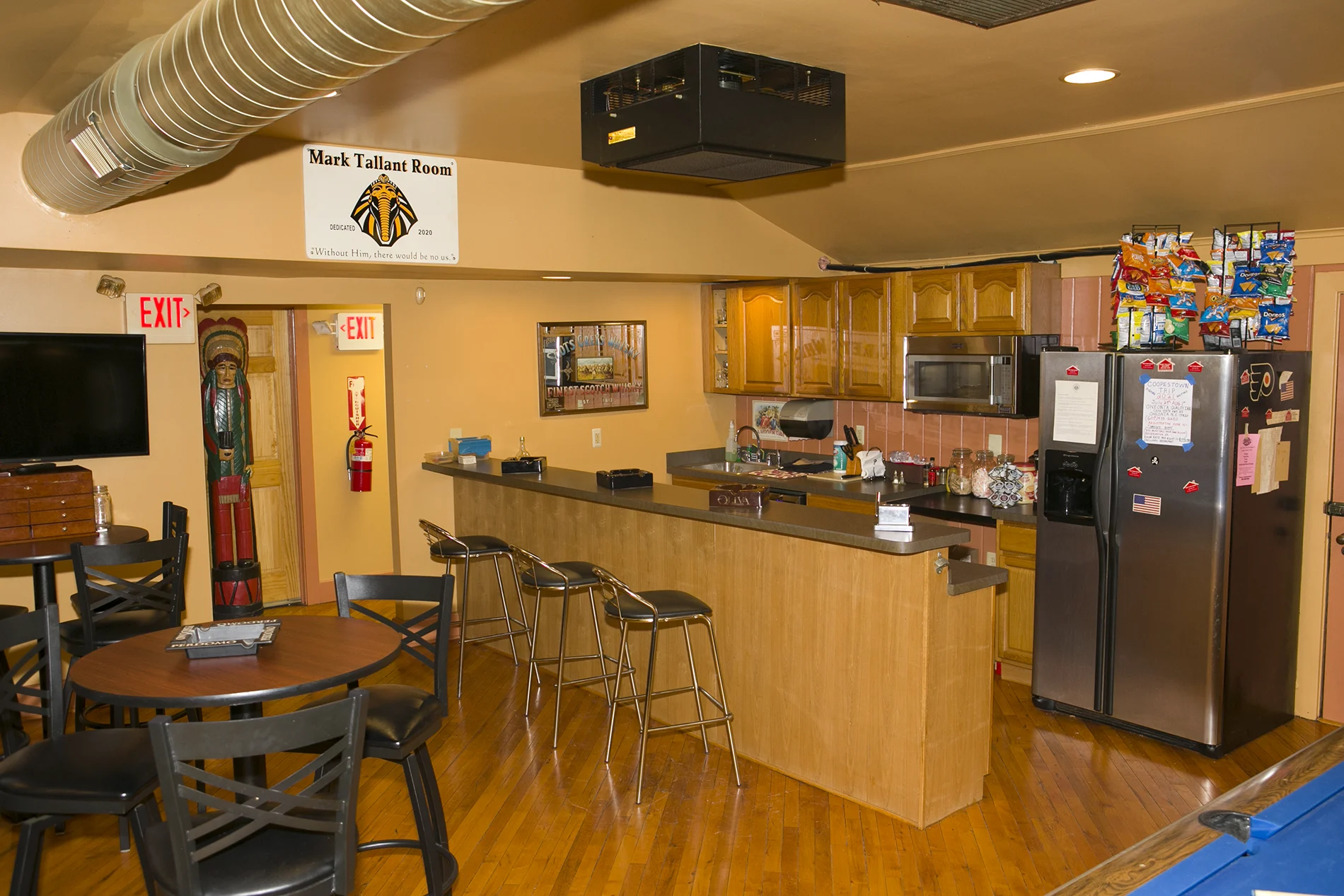 Member bar and kitchen area at Exodus Cigar Lounge